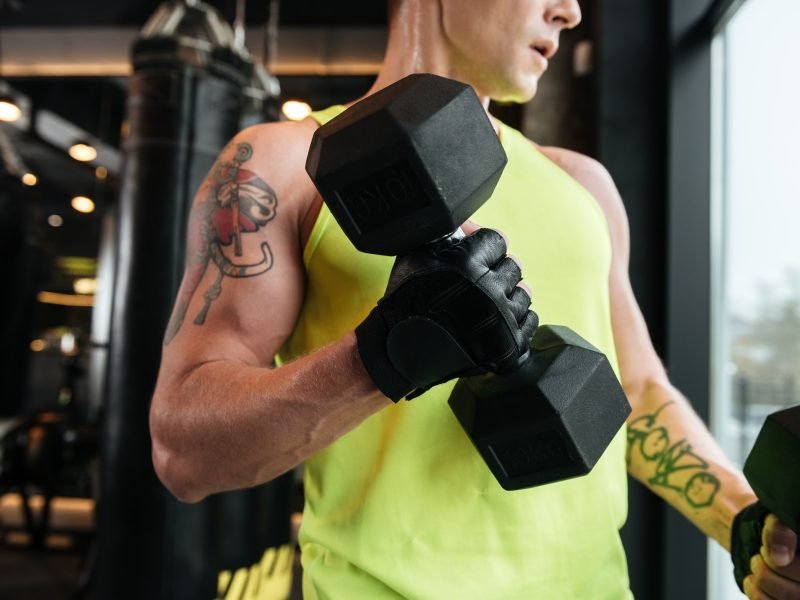 cropped-image-of-a-young-muscular-sportsman.jpg